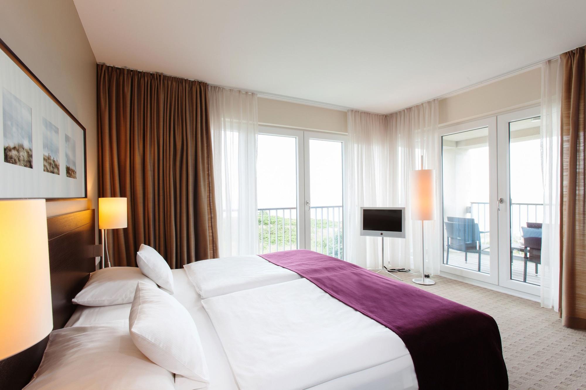ホテル A-Rosa Sylt リスト エクステリア 写真 A typical bedroom at the hotel